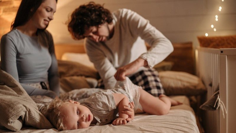 checking diaper rash